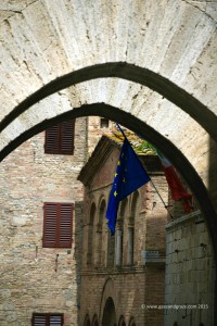 Looking through archways toward the town's landmarks