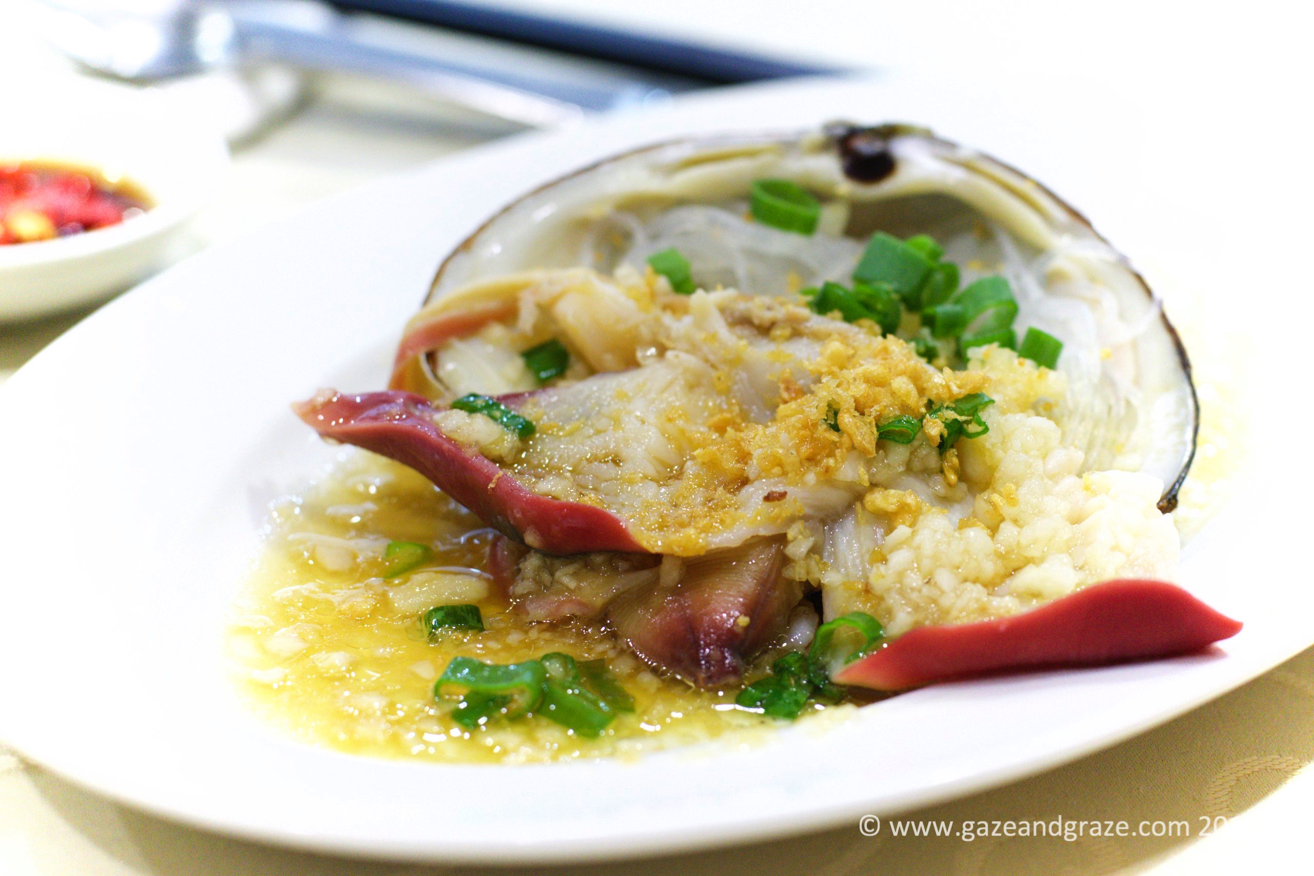 Fresh seafood such as this steamed clam at Jade Palace