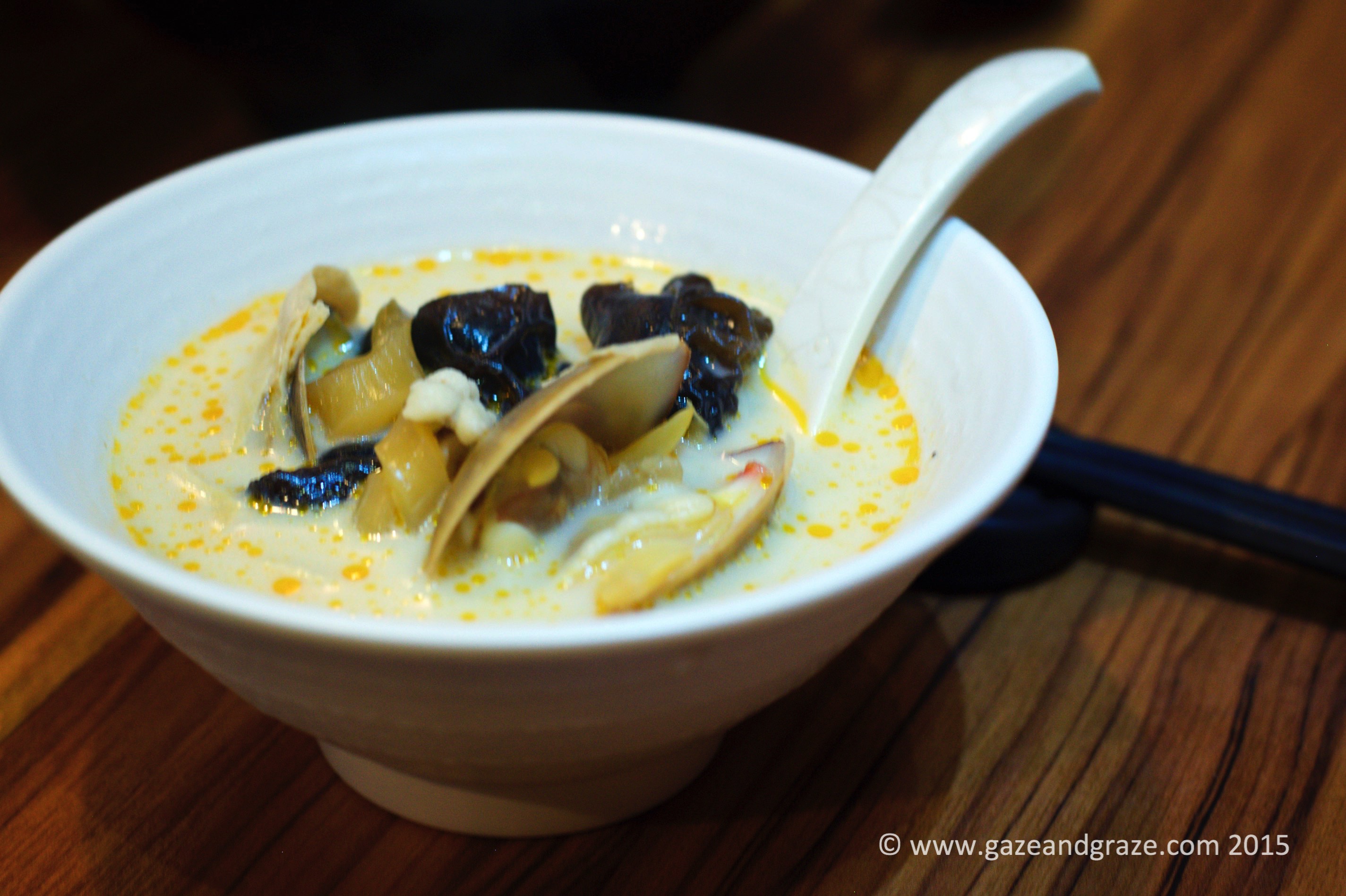 Stone fish broth with fish maw and clams