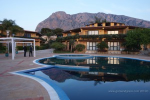 Magaggiari Hotel as the sun sets on the rocky hills of Palermo